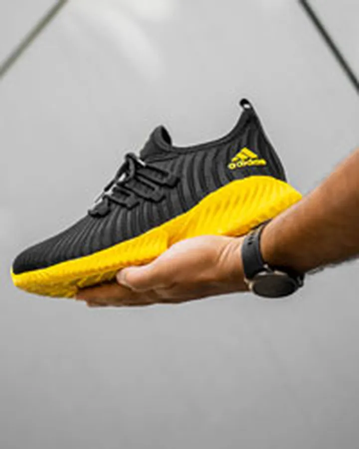 کفش ورزشی Adidas مردانه مشکی زیره زرد مدل Riv