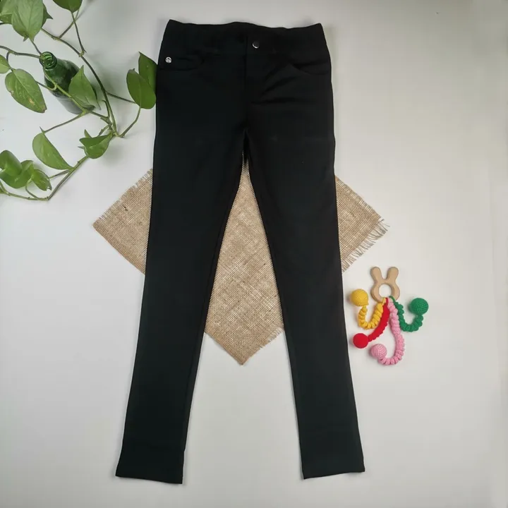 شلوار دخترانه طرح دکمه دار جیبدار مشکی رنگ – 10-11 سال