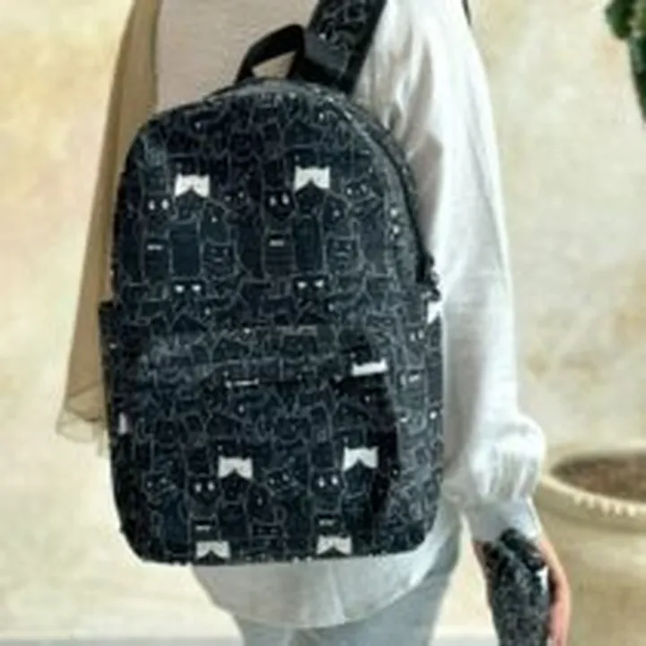 ست کوله پشتی و جامدادی گربه مشکی سفید