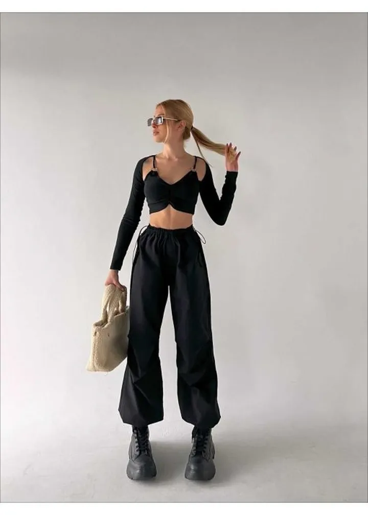 برش نرم پارچه کشی گشاد بافتنی شلوار مشکی زنانه برند P&W Polo Women کد 1711376841