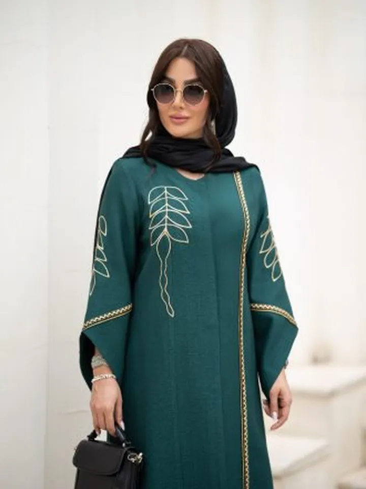 مانتوزنانه  بلند مجلسی گلدوزی شده جنس بابوس  سایزقابل استفاده برای 38 تا 56