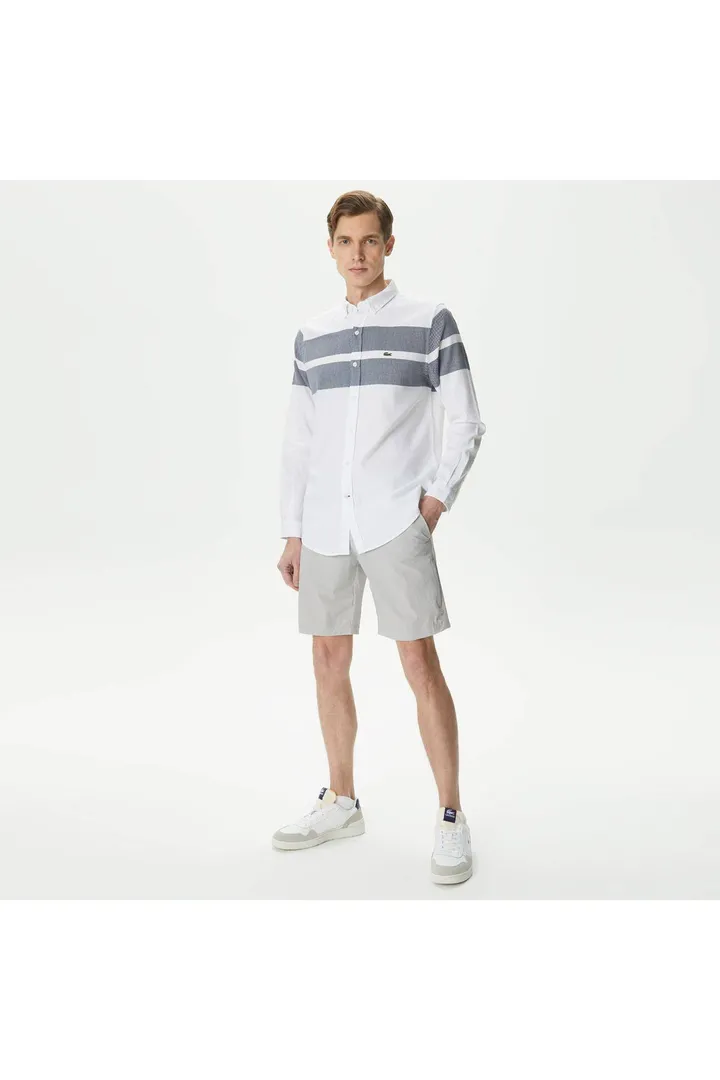 <span class="text-styled__StyledSpan-sc-d280c10c-1 dvOaRP">Lacoste< span>برمودای خاکستری اسلیم فیت مردانه