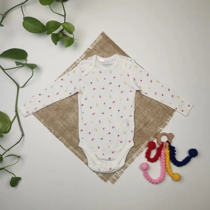 بادی نوزادی دخترانه آستین بلند برند لوپیلو طرح گل دار نباتی رنگ