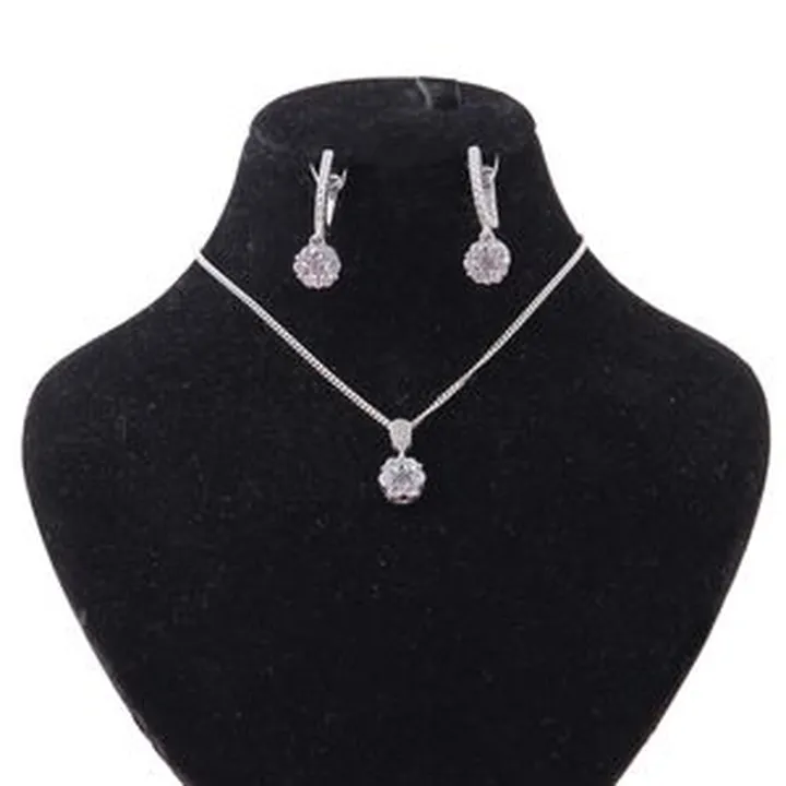 نیم ست نقره زنانه بازرگانی میلادی مدل گل جواهری فول نگین کد NTR_409