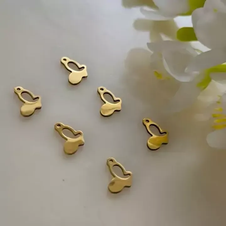 پلاک آویز ساعتی طرح پرروانه طلایی(فروش محصول  بصورت دونه ای میباشد)
