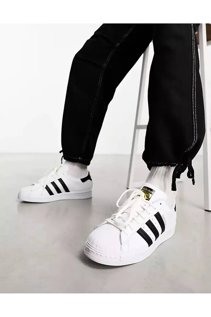 <span class="text-styled__StyledSpan-sc-d280c10c-1 dvOaRP">adidas< span>کفش ورزشی سفید - Superstar Co (gs).