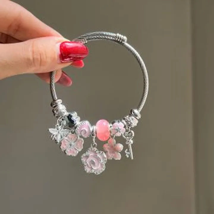 دستبند پاندورا صورتی طرح گل و زنبور