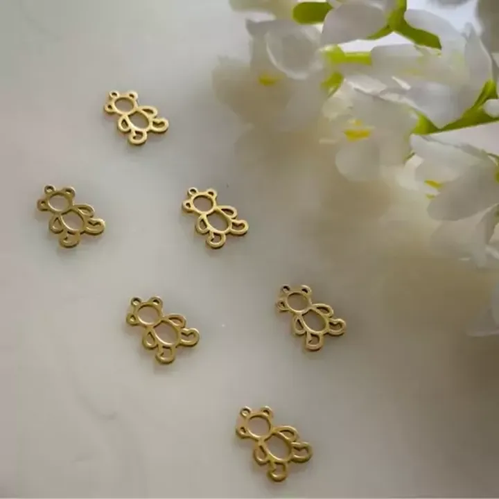پلاک آویز ساعتی طرح تدی طلایی(فروش محصول  بصورت دونه ای میباشد)