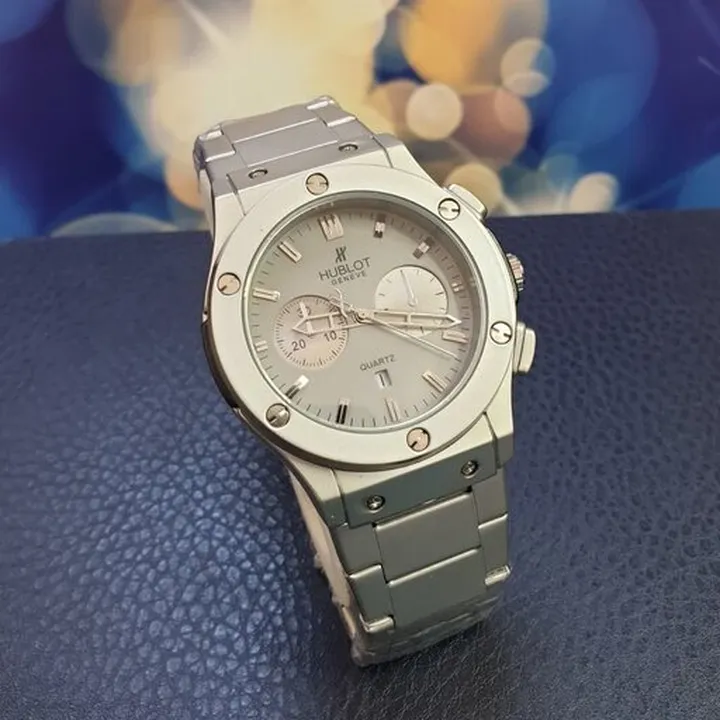 ساعت مردانه و پسرانه طرح هابلوت بند فلزی با گارانتی موتور Hublot 