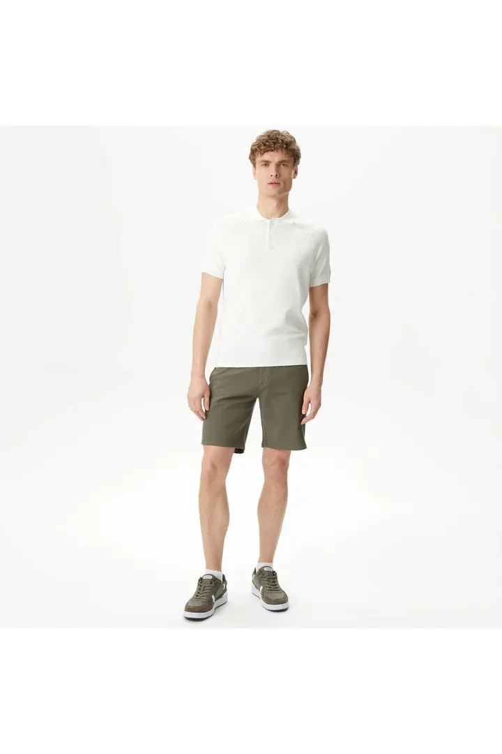 <span class="text-styled__StyledSpan-sc-d280c10c-1 dvOaRP">Lacoste< span>برمودای خاکی اسلیم فیت مردانه