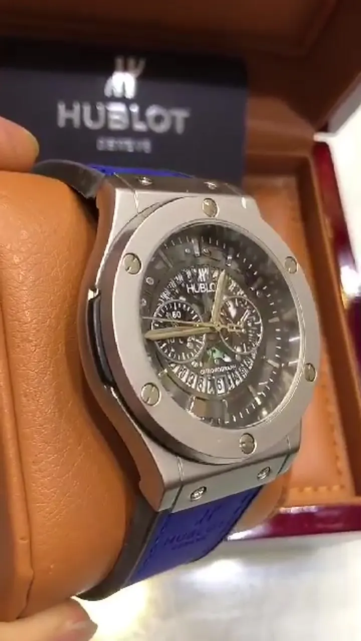 ساعت مچی مردانه هابلوت تقویم نمایان طرح کرنو موتور شرکتی  HUBLOT