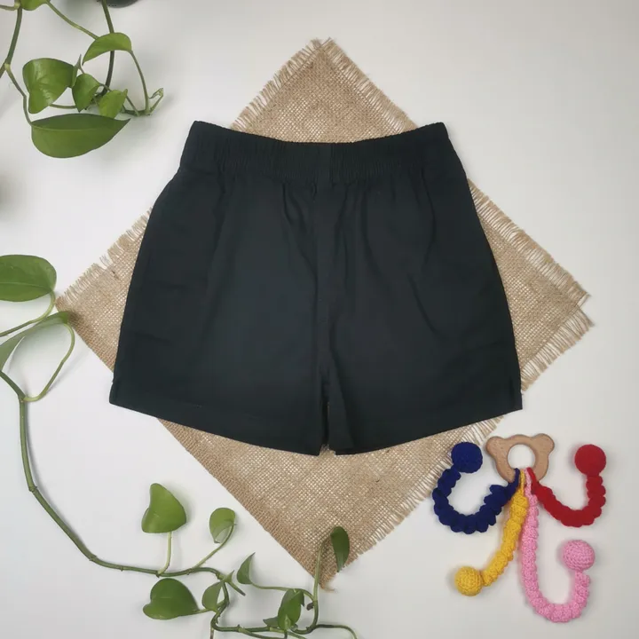 شلوارک برند Tu طرح جیب دار مشکی رنگ – 7 سال