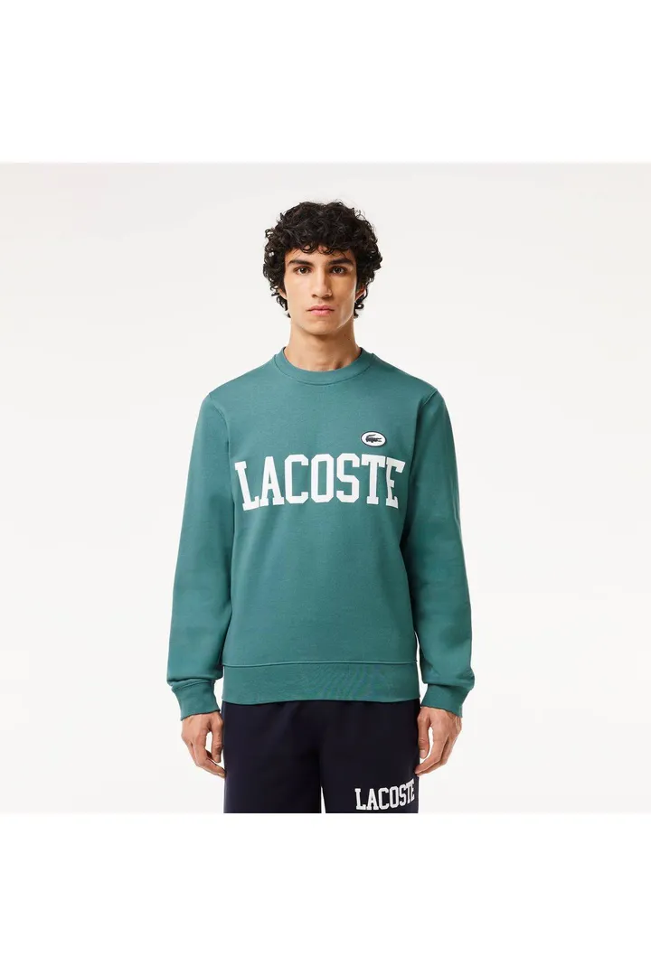 <span class="text-styled__StyledSpan-sc-d280c10c-1 dvOaRP">Lacoste< span>ژاکت آبی مردانه کلاسیک فیت