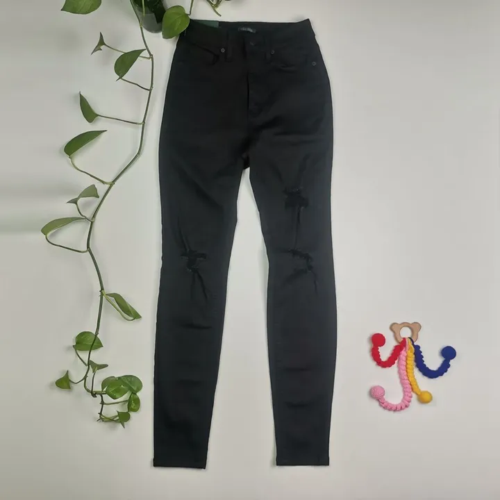 شلوار جین جذب طرح پاره مشکی رنگ – 10-11 سال