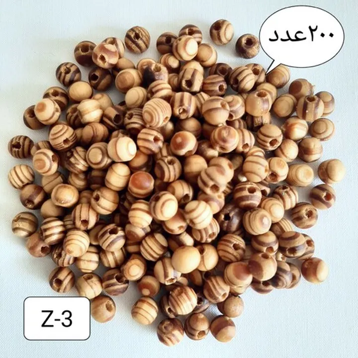 مهره چوبی گرد زیتون طرح دار Z-3