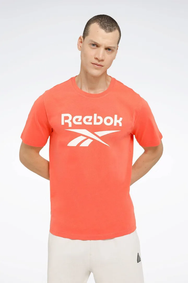 <span class="text-styled__StyledSpan-sc-d280c10c-1 dvOaRP">Reebok< span>تیشرت آستین کوتاه مردانه نارنجی لوگو IDENTITY BIG