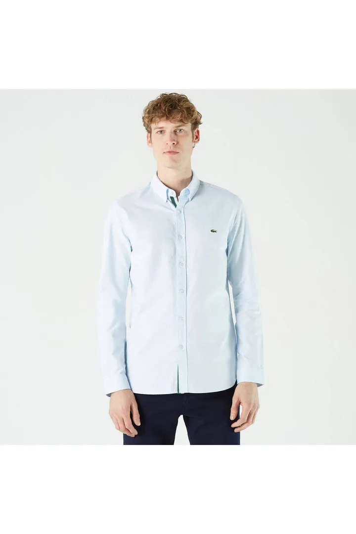 <span class="text-styled__StyledSpan-sc-d280c10c-1 dvOaRP">Lacoste< span>پیراهن یقه دکمه دار مردانه باریک و آبی روشن