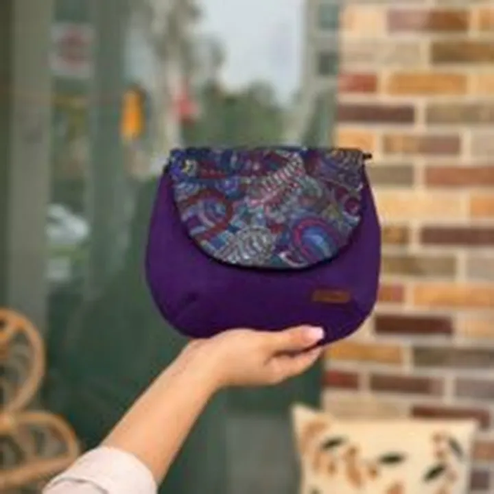 کیف نقلی بنفش طرحدار