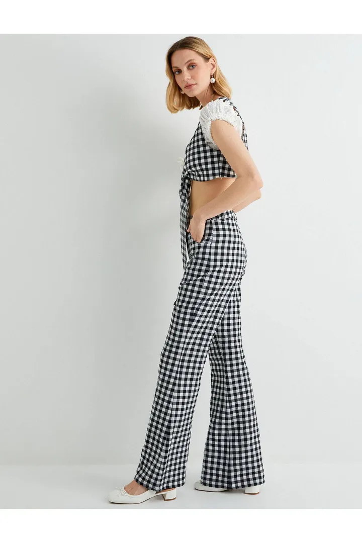 <span class="text-styled__StyledSpan-sc-d280c10c-1 dvOaRP">Koton< span>X Tuba Ünsal - Gingham Flare Leg Trousers Slim Fit