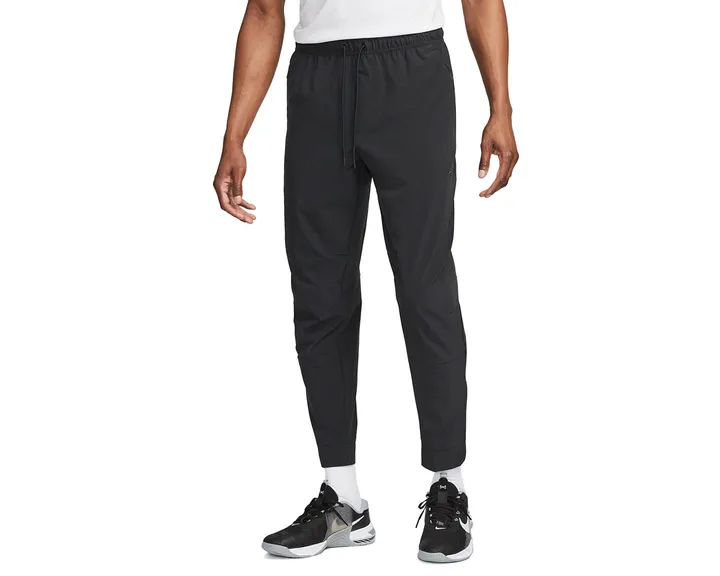 <span class="text-styled__StyledSpan-sc-d280c10c-1 dvOaRP">Nike< span>شلوار گرمکن معمولی Nike M Nk Df Unlimited Pant Tpr