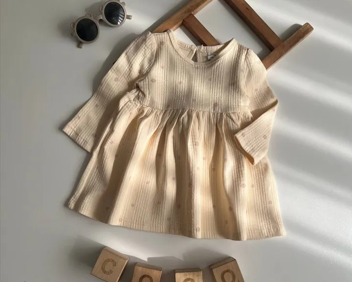 پیراهن دخترونه کرم پاستیلی گلدار