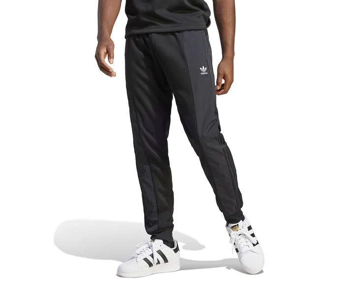 <span class="text-styled__StyledSpan-sc-d280c10c-1 dvOaRP">adidas< span>شلوار گرمکن معمولی Re-Pro Sst Pant